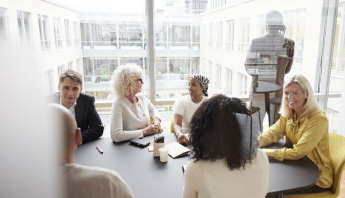Kontorsfotografering "Kollegor på kreativt kontor" i Stockholm
